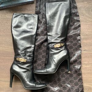 Gucci knee high stiletto boots w gold buckle